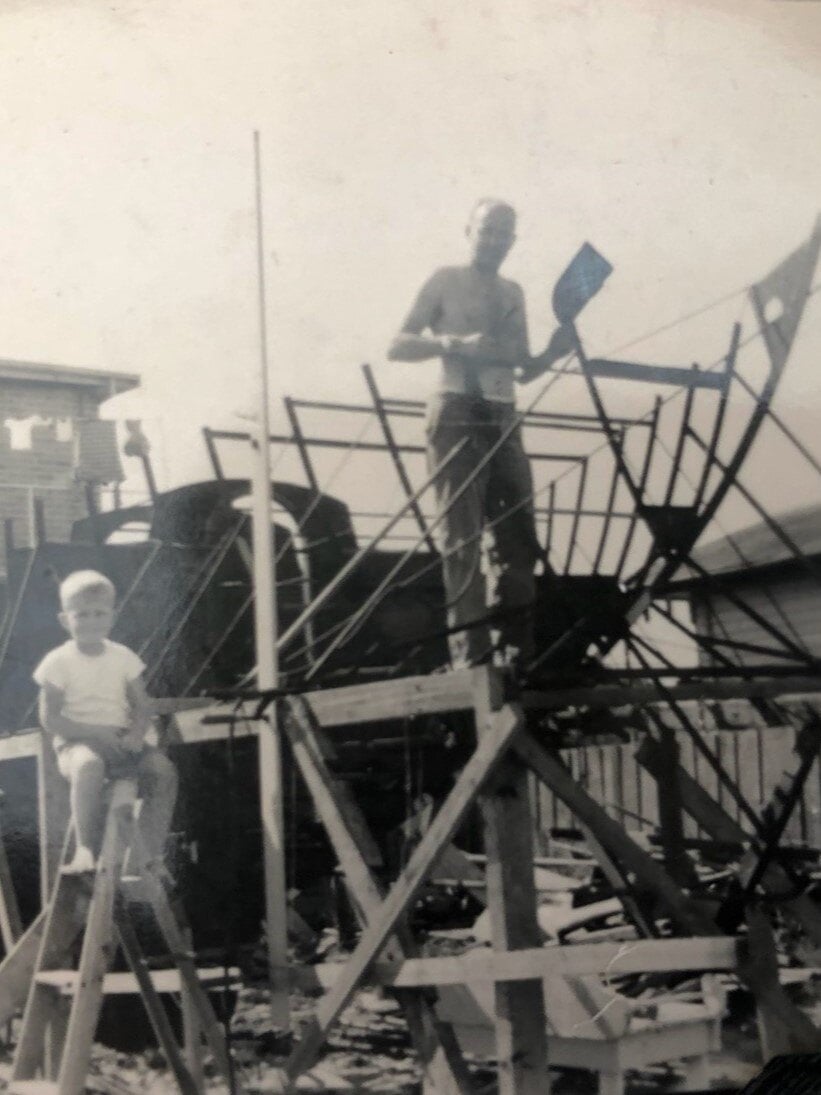 Harry Westerdyk constructing one of his early yachts with son Harry alongside