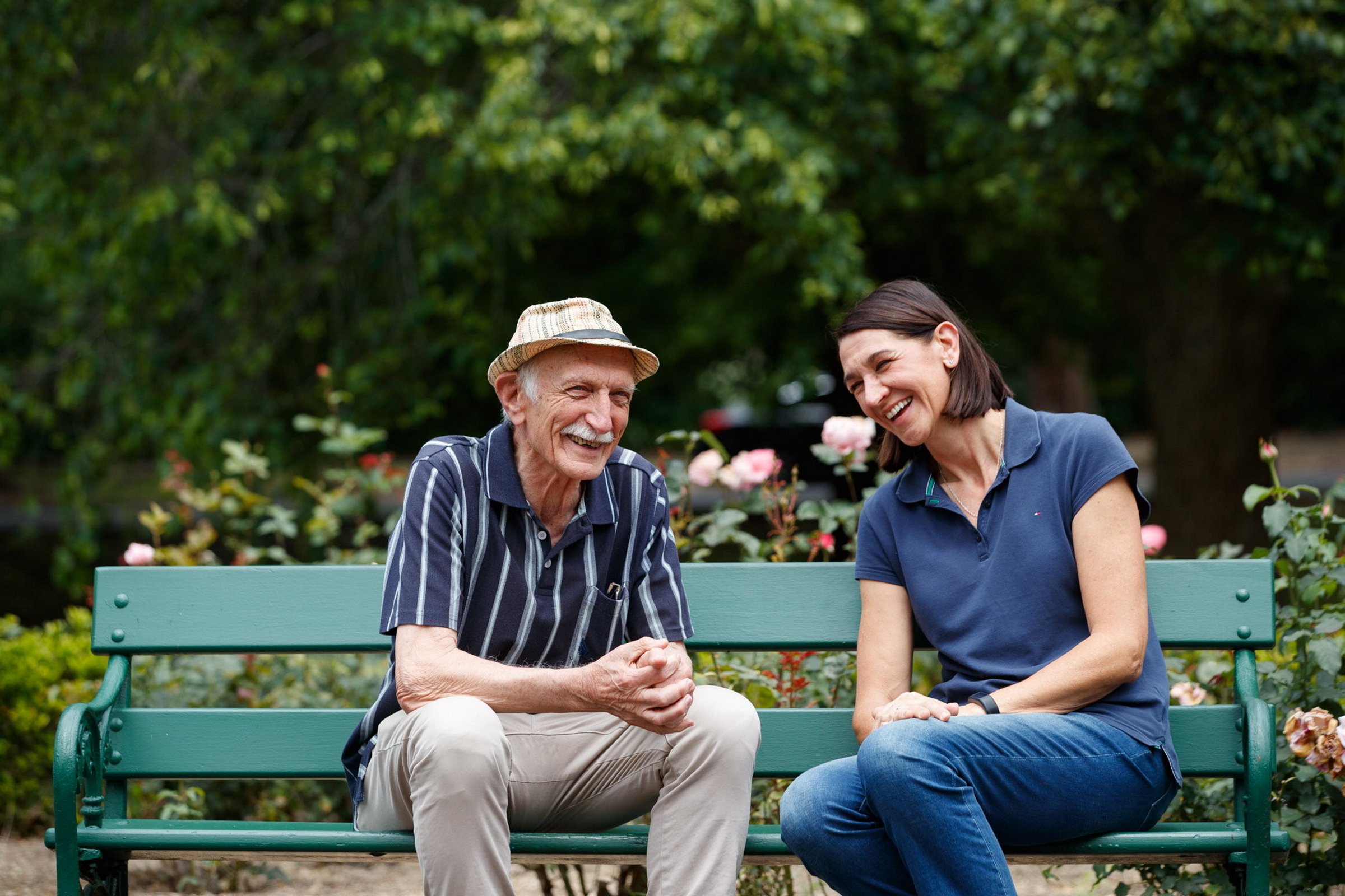 An older man and a carer at HammondCare Wahroonga, an aged care home in Sydney's Upper North Shore.